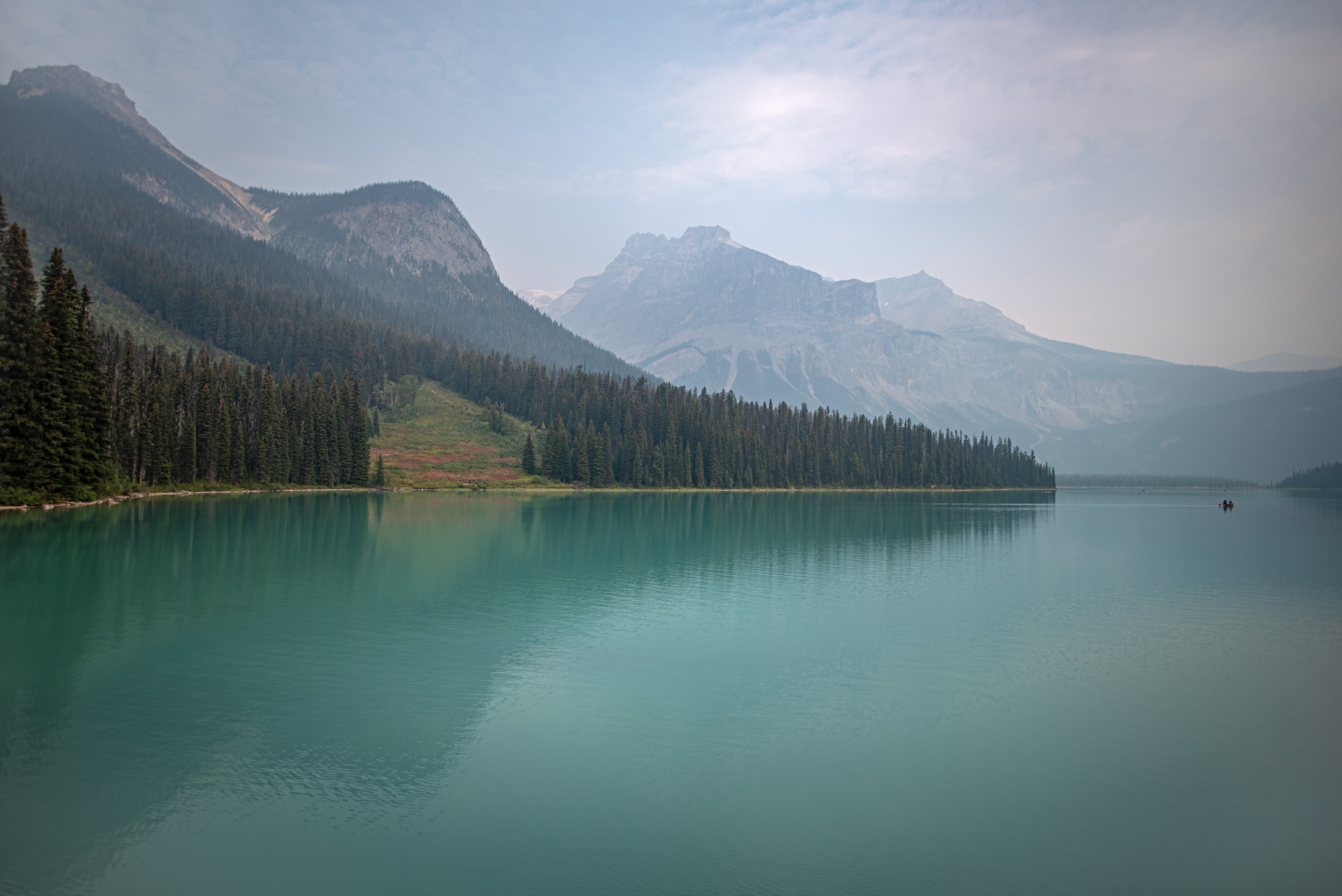 Emerald Lake — Soft haze hangs over the teal water of Emerald Lake in the Canadian Rockies