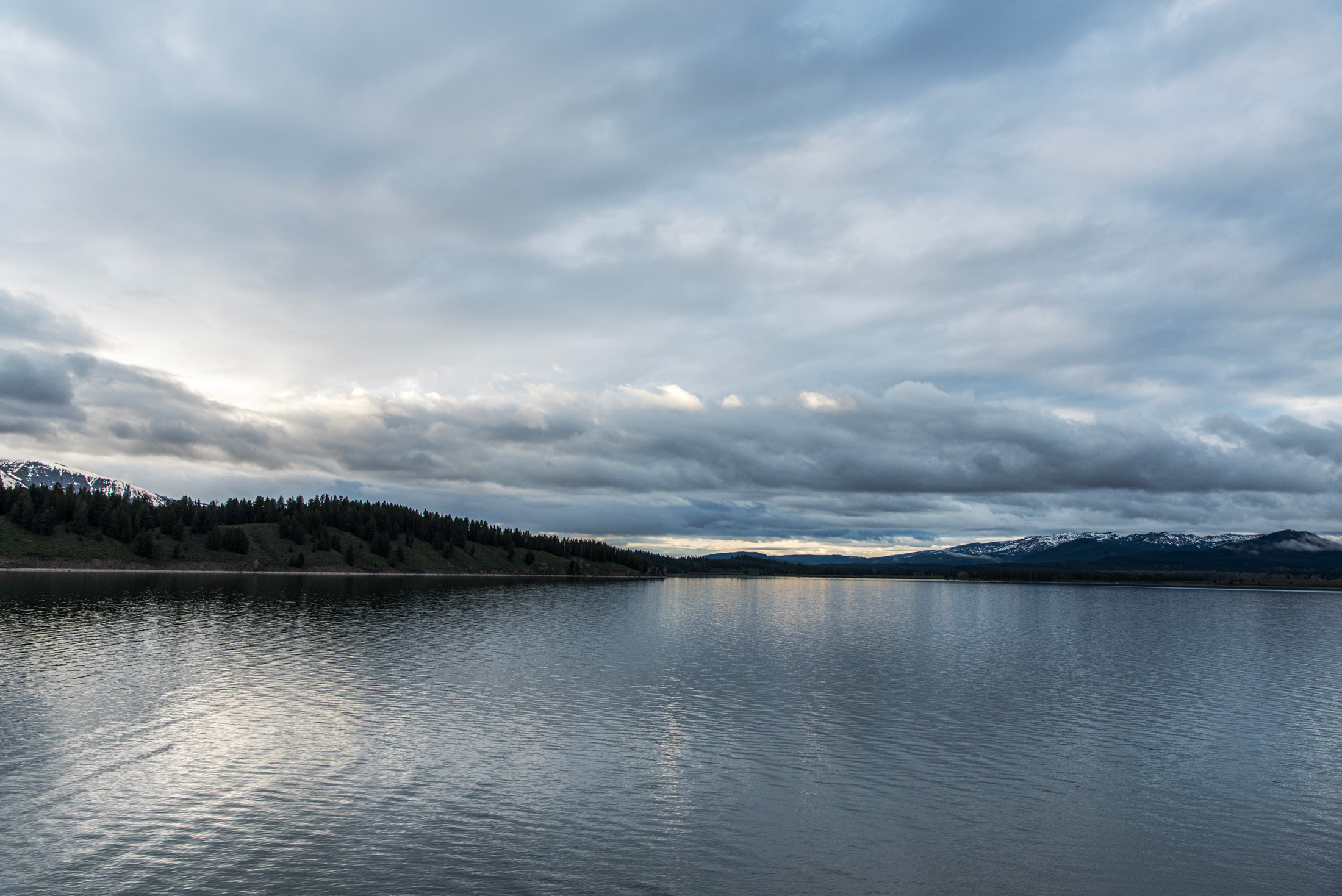 Jackson Lake — A quiet, silver evening settles over Jackson Lake in Grand Teton National Park