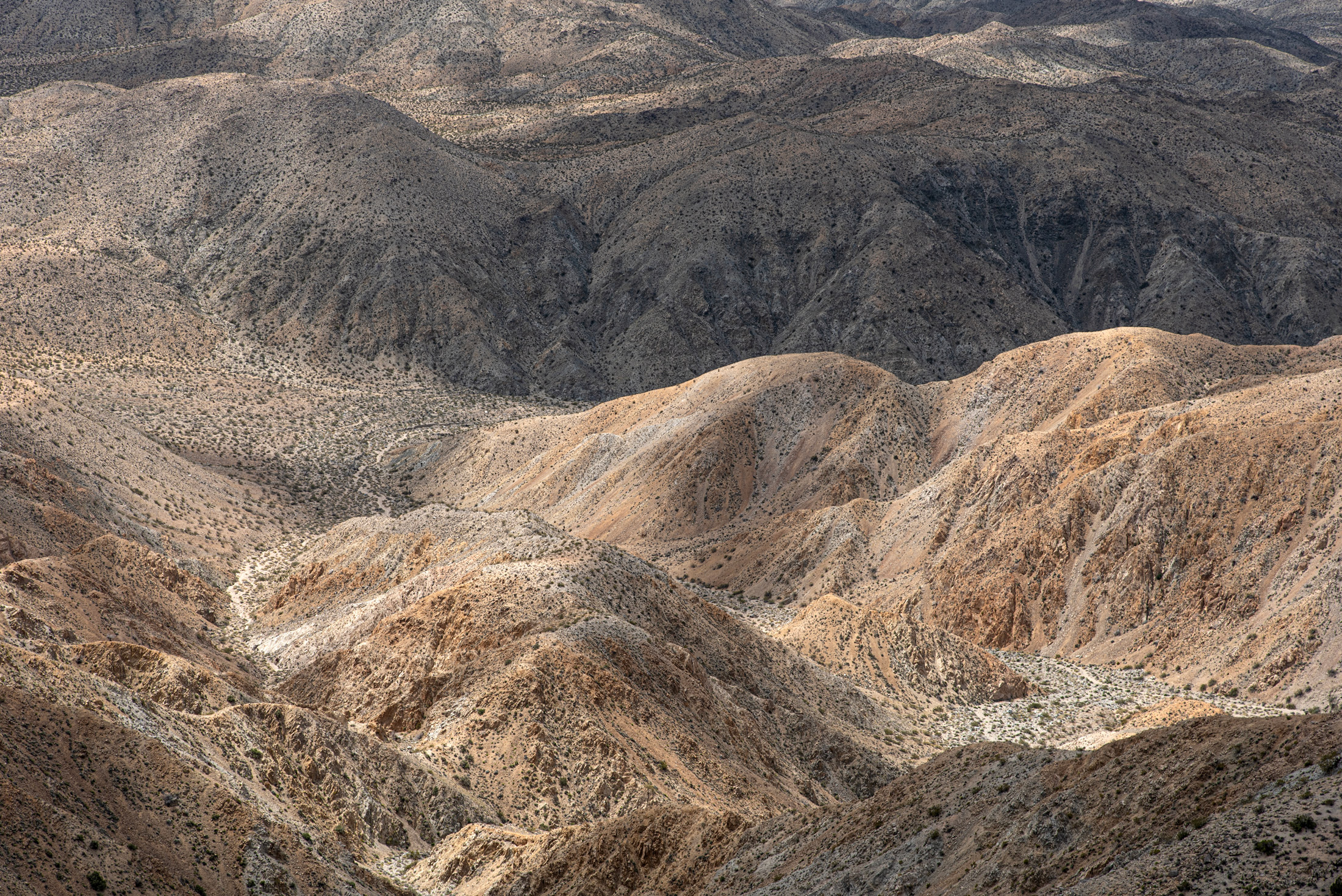 The Joshua Tree Desert — Bare hills fold like wrinkled fabric in the high desert of Joshua Tree National Park