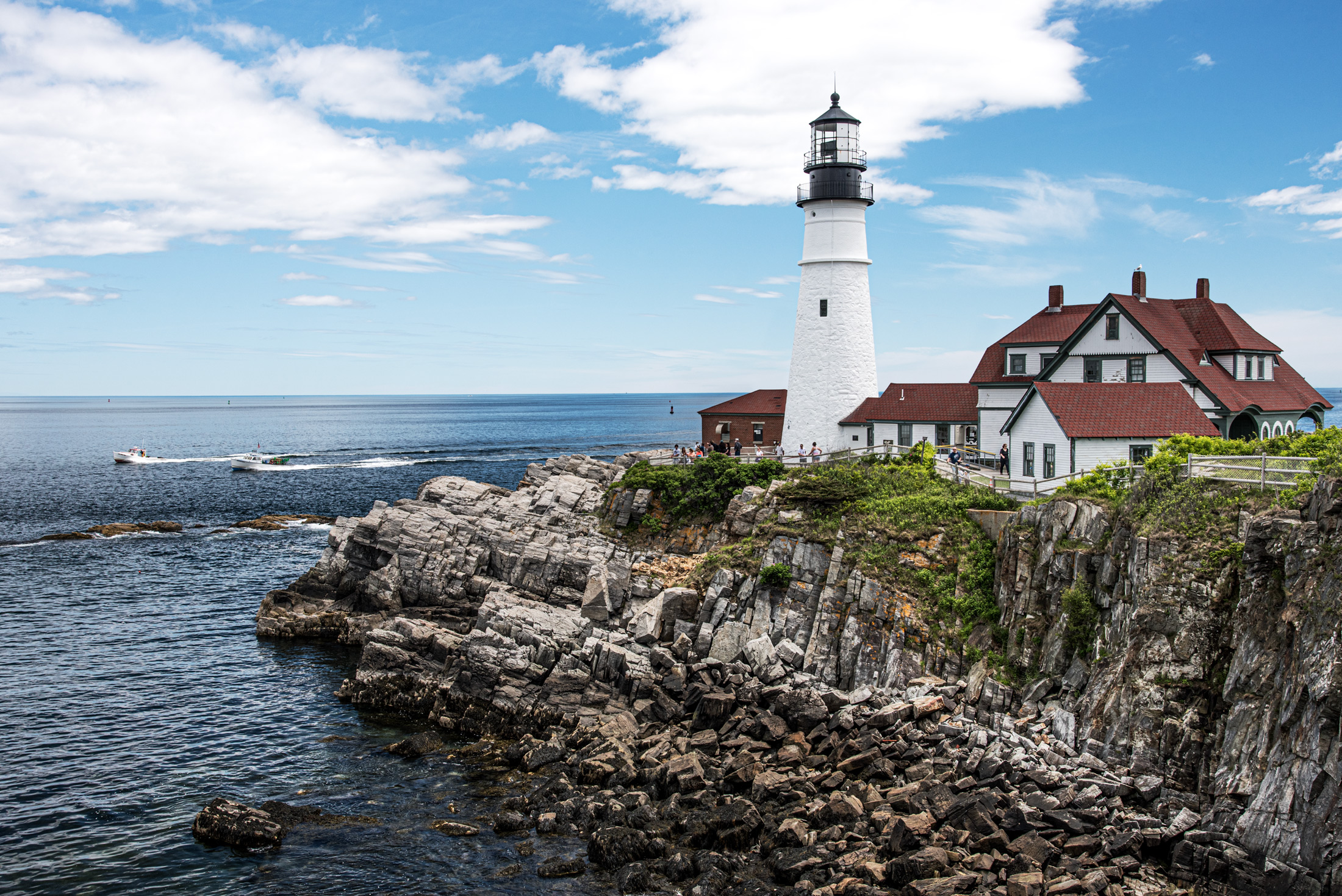 Portland Head Light — Portland Head Light and its red-roofed keeper's house stand over the rocks of Cape Elizabeth, Maine