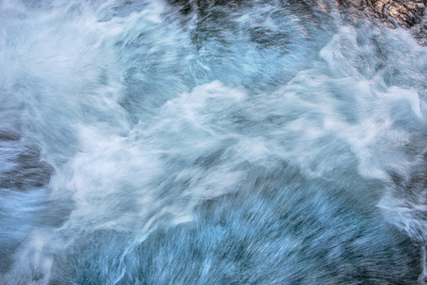 The River in Motion — Churning whitewater dissolves into smoke and silk in the mountains of Washington State